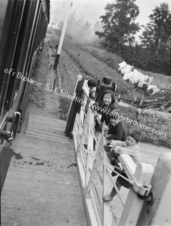 VIEW FROM ROSSLARE TRAIN CHILDREN ON LEVEL CROSSING